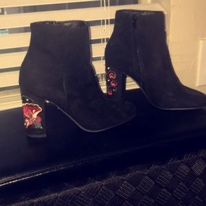 Black and floral heeled ankle boots